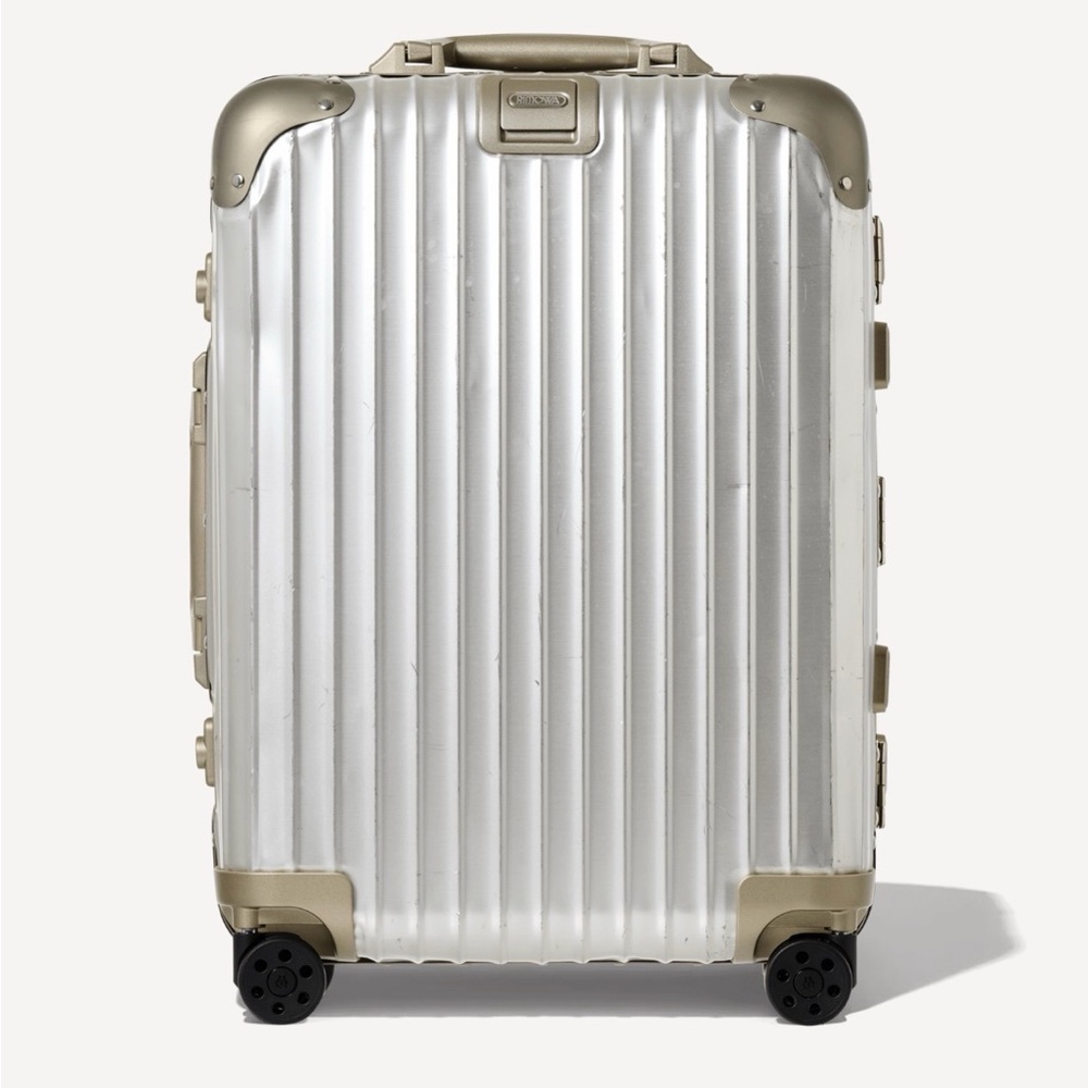 RIMOWA Silver Aluminum Carry-On with Champagne Accents